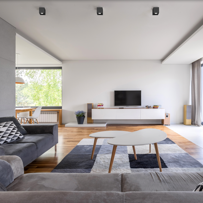 Applique murale Branco au design cubique moderne, diffusant une lumière douce et apaisante pour une salle de bain élégante, épurée et durable.