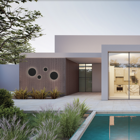 Applique murale Combo XL au design architectural et audacieux, composée de cercles lumineux diffusant une lumière douce et immersive, idéale pour sublimer les grands espaces intérieurs ou extérieurs avec élégance et caractère.