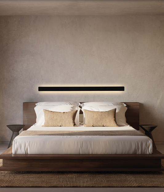 Applique murale Fosca au design sobre et contemporain, offrant une lumière nette et confortable, installable à l’horizontale ou à la verticale pour un éclairage équilibré et adaptable à chaque espace.