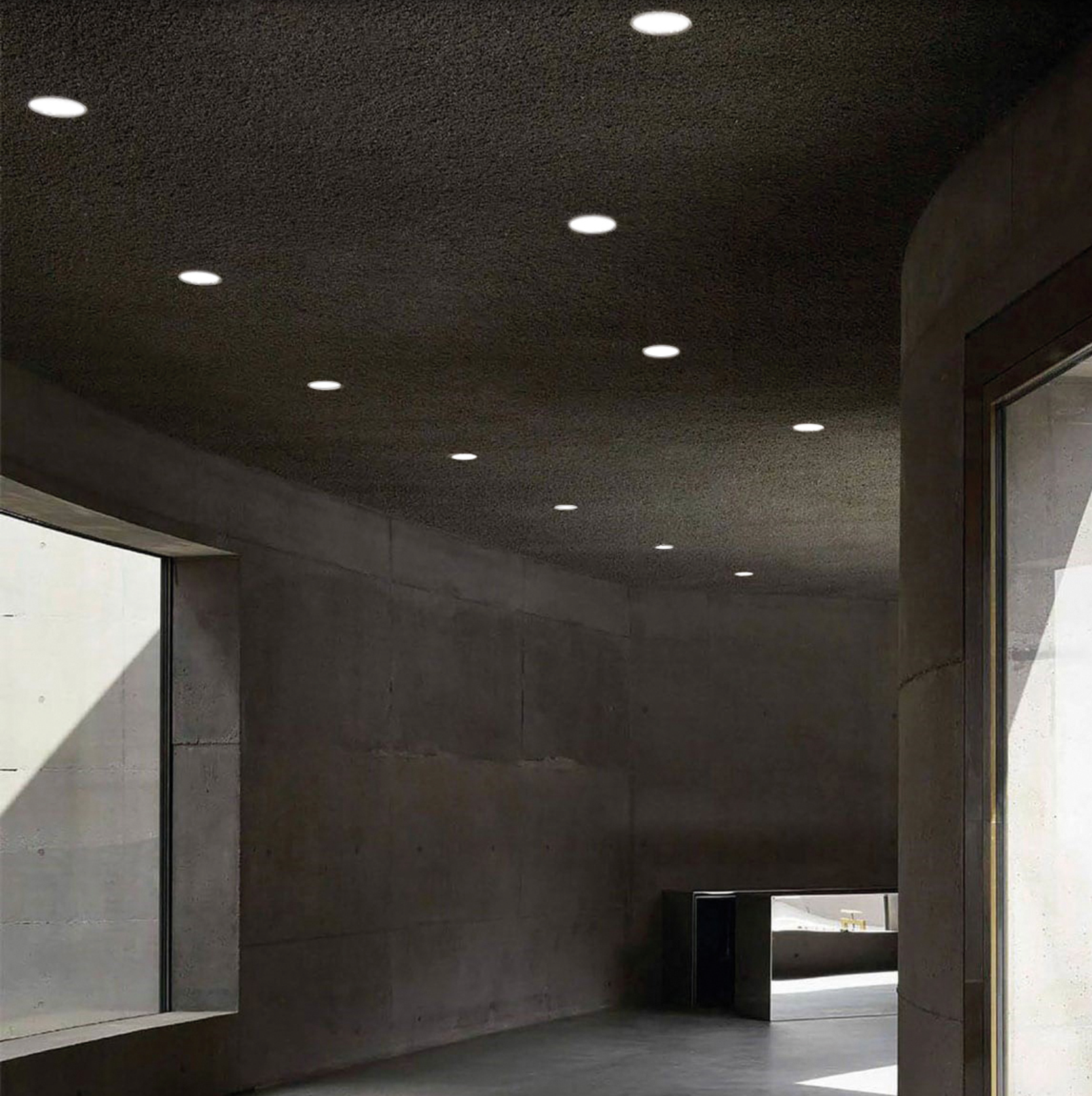 Plafonnier Kidal au design minimaliste, diffusant une lumière douce et ajustable selon la température de couleur, résistant à l’humidité grâce à sa protection IP44.