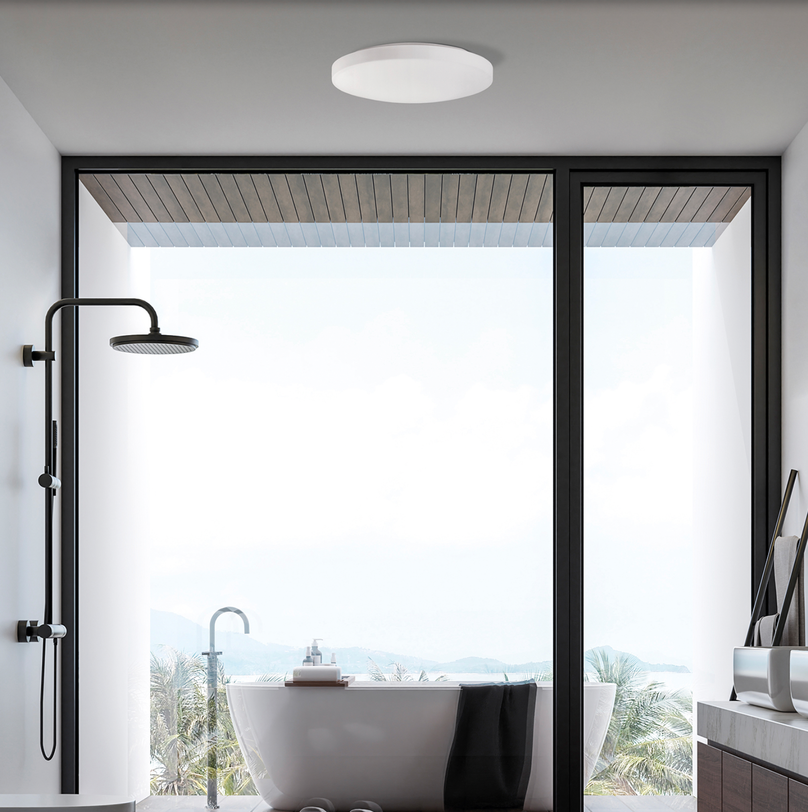 Plafonnier Moon, symbole de sérénité et de simplicité. Sa lumière douce et homogène crée une atmosphère apaisante dans chaque pièce. Résistant à l’humidité, il s’intègre aussi bien dans une salle de bains que dans un salon, pour un éclairage harmonieux et intemporel.