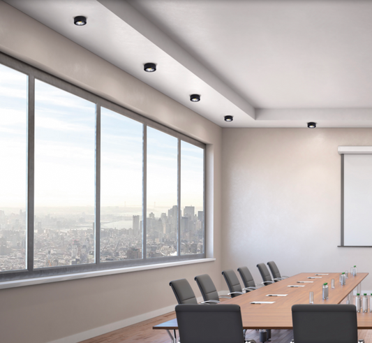 Plafonnier circulaire LED au design moderne et raffiné, diffusant une lumière douce et chaleureuse idéale pour les salons et espaces de vie.