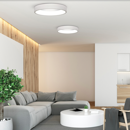 Plafonnier Dilga, alliance parfaite entre design et harmonie. Sa lumière LED douce et homogène met en valeur les volumes tout en créant une atmosphère chaleureuse et équilibrée. Un cercle lumineux intemporel qui sublime chaque pièce avec élégance.